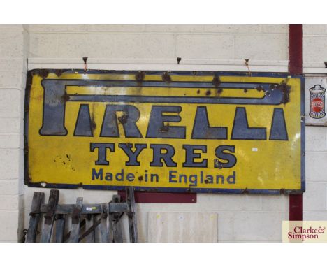 A large "Pirelli Tyres Made In England" enamel sign, approx. 84" x 36"