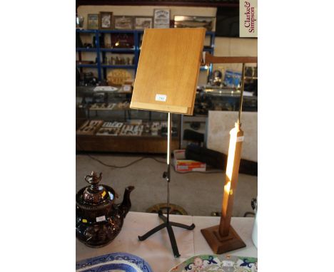 A light oak display stand 