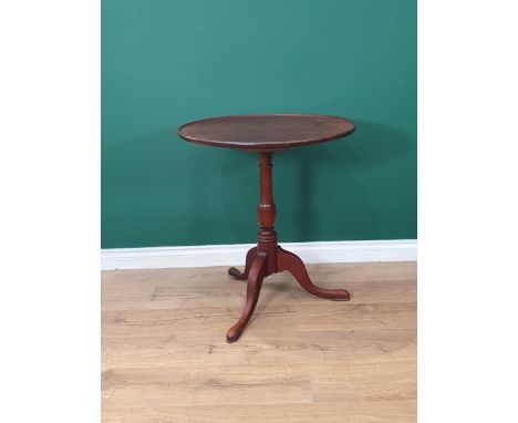 A Georgian mahogany Pillar Table with single piece dished top on baluster column and tripod base 25in Dia. Repair to edge of 