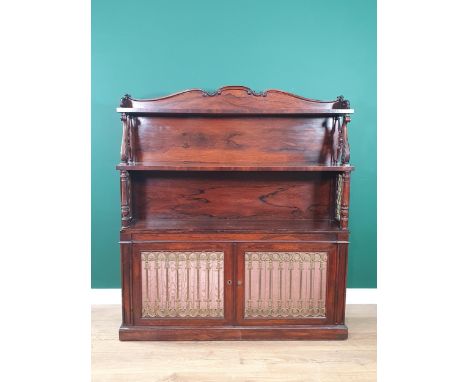 A Victorian rosewood Chiffonier Cabinet with shaped top, carved and turned support to the raised shelf below with brass grill