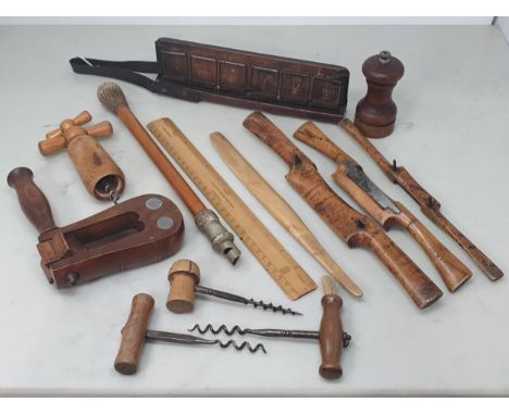 A collection of treen and related items including four Corkscrews, a vintage Football Rattle bearing the name 'J.Wood, Geo. S