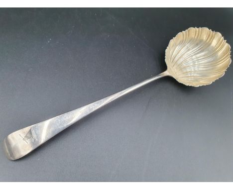 A George III silver Ladle old English pattern with scallop Bowl, engraved crest, circa 1770, maker: I.L 