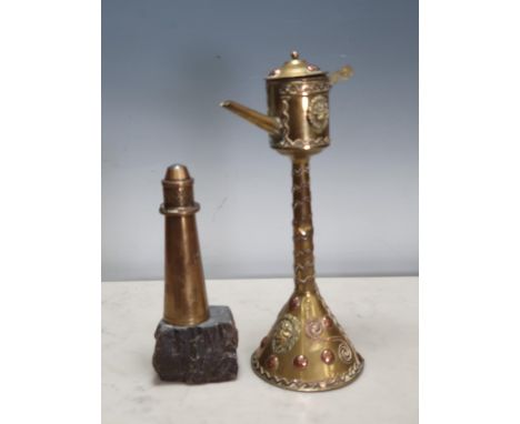 A brass model of a Lighthouse mounted on a piece of stone, 6 1/4in H, and a Whale Oil Lamp 