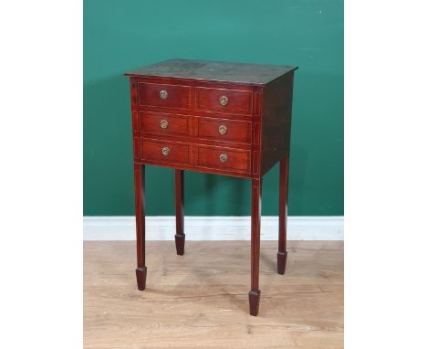 An Edward mahogany Lamp Table fitted three drawers with rope style inlay, raised on squared tapering supports with spade feet