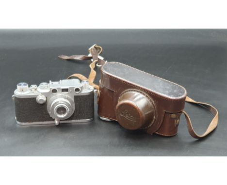 A Leica IIIc Camera No 498705, in original leather case