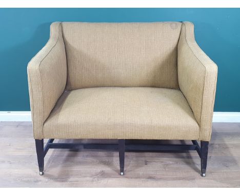 A Georgian upholstered Sofa raised on mahogany tapering support on casters with squared stretchers, 3ft 9in W x 2ft 8in Deep 