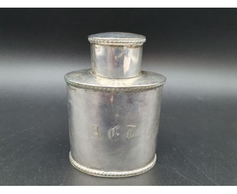 A Victorian silver oval Tea Caddy with gadroon rims and engraved initials, London 1893 