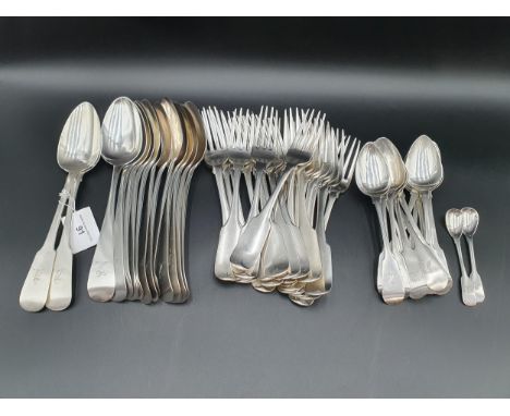 A matched Set of 19th Century Irish silver Cutlery all engraved with dragon head crest, viz: 23 Dinner Forks fiddle pattern, 