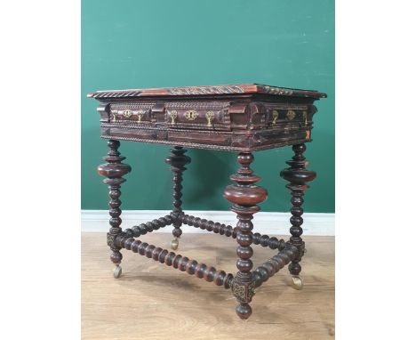 An Anglo-Portuguese small Table with moulded edge, fitted two dummy and two real drawers and raised on turned and bobbin turn