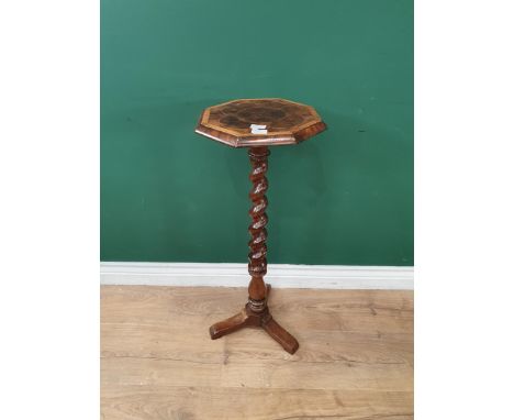 An 18th Century oyster veneer Candle Stand with octagonal top with satinwood crossbanding and stringing, on spiral turned col