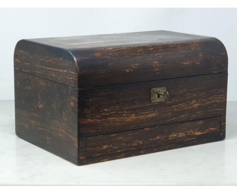 A 19th Century coromandel Vanity Case and key, with hinged lid enclosing assorted silver plated lidded bottles &amp; containe