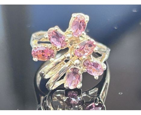 9ct Gold ring set with 6 pink gem stones Size N Weight 3.8g