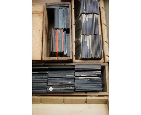 Three boxes of Magic Lantern slides