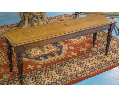 HALL BENCH, early Victorian mahogany with lappet carved legs, 125cm x 33cm.