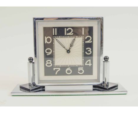 ART DECO TABLE CLOCK, circa 1930's with chrome and bakelite case, 14cm H x 20.5cm max.