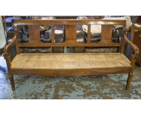 FRENCH COUNTRY BENCH, mid 19th century French, walnut with scroll arms and rush bench seat, 177cm W. 