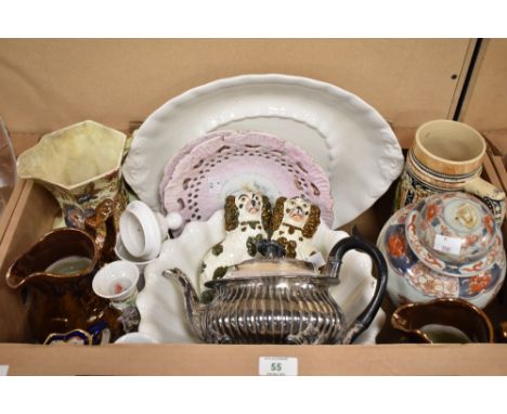 A selection of jugs including a small Mason's 'Mandalay' jug, a Maling 6549/71 green lustre jug and two copper lustre ware ju