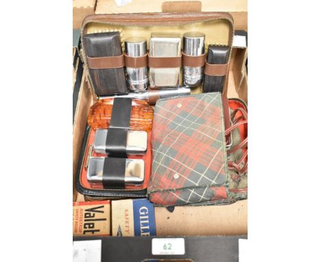 Two men's travel grooming kits, a vintage Philips PhiliShave razor and two safety razors in original boxes