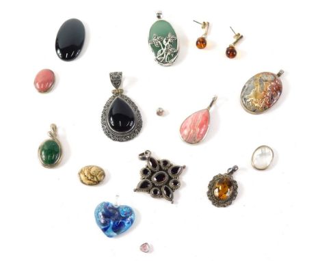 A group of silver and other costume jewellery pendants, each stone set, to include garnets, black onyx, citrine, mother of pe