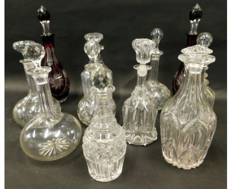 Various decanters, to include a matched pair of flash ruby glass examples with stoppers, each approximately 37cm high, variou