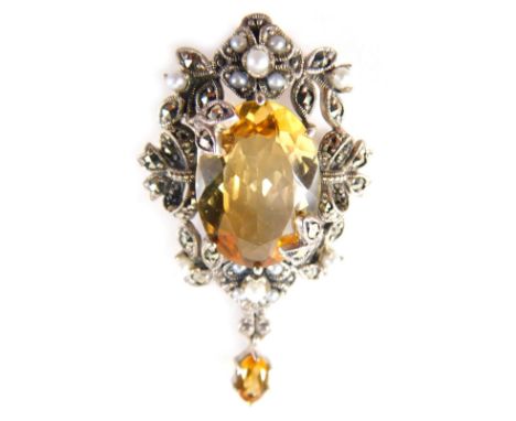 A citrine marcasite and blister pearl pendant, set in white metal stamped 925, 4.5cm high, on a rope twist neck chain marked 