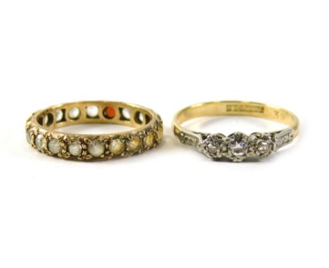 Two dress rings, comprising a 18ct gold and platinum diamond three stone illusion set dress ring, size O, 3.6g, and a 9ct gol