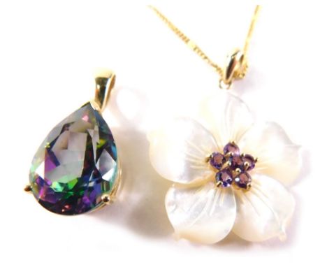 A 9ct gold pendant, with mother of pearl flower set with central amethyst, on a 9ct gold clasp, 3cm high, on a later plated c