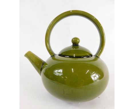 A Linthorpe pottery kettle, no.1460, green glazed with flying handle, removable domed lid and shaped spout, impressed 1460 be