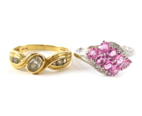 Two dress rings, comprising a 14ct gold cz twist ring, ring size R½, and a 9ct white gold pink topaz and cz dress ring, ring 