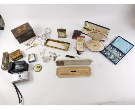 Costume jewellery and effects, mantel clock, faux pearl necklaces, brooches, bangles, earrings, silver plated cutlery, etc. (