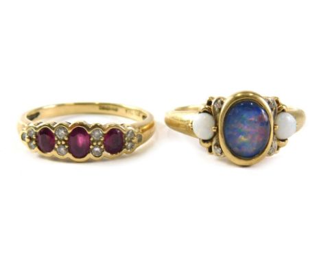 Two 9ct gold dressings, comprising an opal duplet cluster ring, ring size S½, and a 9ct gold garnet and diamond half hoop dre