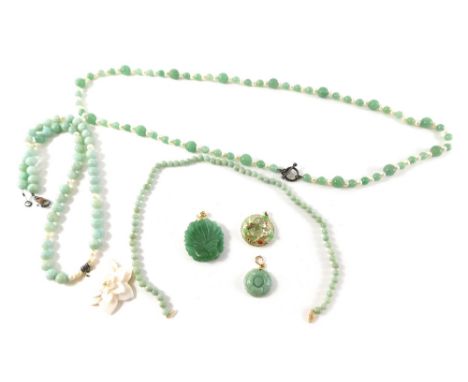 A group of pale green hardstone jewellery, comprising a necklace with mother of pearl flower, a cultured pearl and faceted be