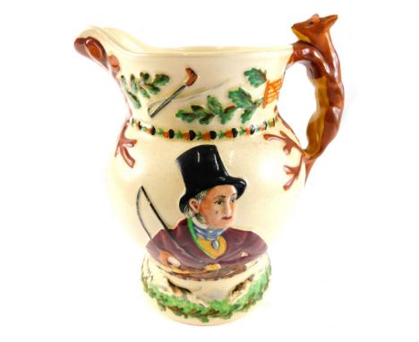 A Crown Devon John Peel hunting jug, with fox handle, polychrome decorated, printed marks beneath, 23cm high. 