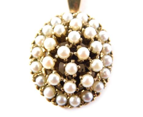 A Victorian style pearl pendant and chain, the oval pearl of three layered design, with adjustable clasp, yellow metal, unmar