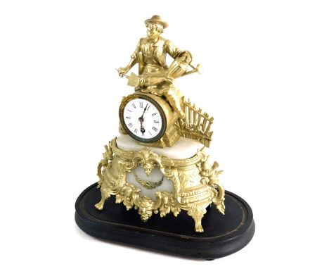 A Victorian and later gilt metal and marble mantel clock, the 8cm diameter enamel Roman numeric dial, surmounted by figure of