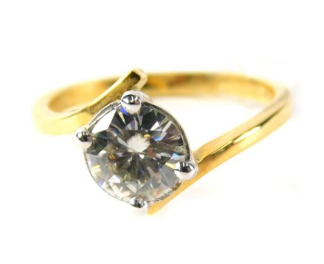 An 18ct gold single stone dress ring, set with imitation diamond, in four claw setting with twist design shoulders, ring size