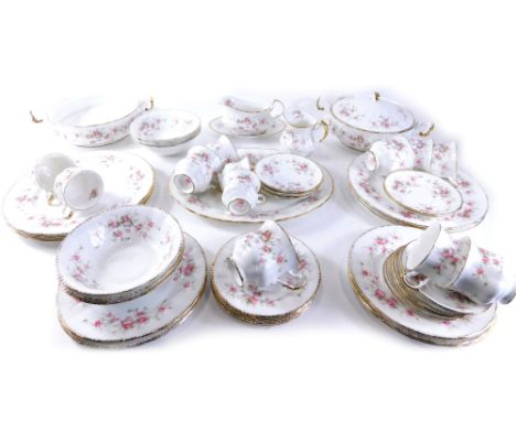 A Paragon Victoriana Rose part dinner service, to include a lidded tureen and an open tureen, 30cm wide, meat plate, gravy bo