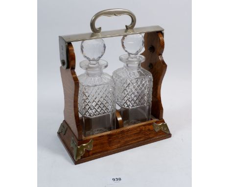A Betjemanns oak two bottle tantalus 
