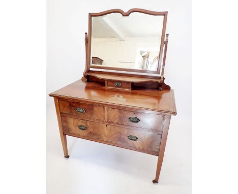 An Edwardian mahogany dressing table with swing mirror, two short over one long drawer, 114cm 