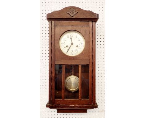 An oak glazed wall clock, 58cm tall 