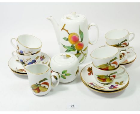 A Royal Worcester Evesham coffee set comprising: coffee pot, six cups and saucers, milk and sugar 