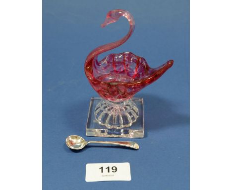An early 19th century pink streaked glass swan form salt on lemon squeezer base, with silver salt spoon 