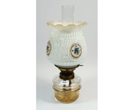 A Victorian oil lamp with white moulded shade printed violets 