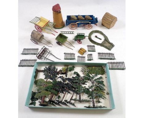 A group of Britains lead trees, fencing, hayricks and farm carts including Haywain, roller etc. 