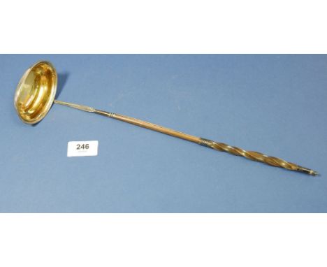 A Georgian silver punch ladle with horn handle, 38cm long 