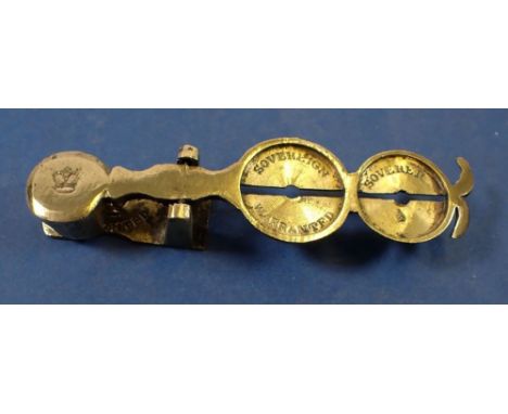 A Victorian brass warranted sovereign scale 