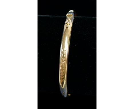 A gold bangle, 6.7g unmarked but tested as gold 