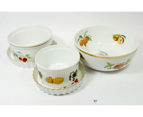 A Royal Worcester Evesham large fruit bowl, two souffle dishes and two flan dishes 