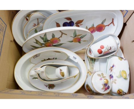 A collection of Royal Worcester Evesham oven to tableware comprising: four various serving dishes, a butter dish, asparagus d