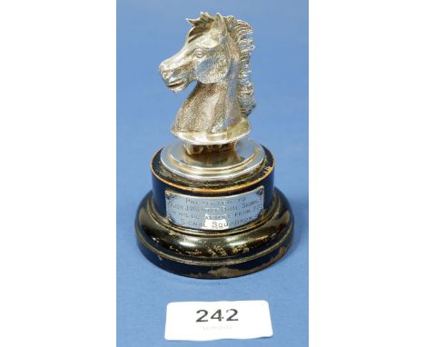 A silver horses head military trophy on plinth base, by Garrard &amp; Co Ltd, London 1961, 157g, presented by the Signal Squa